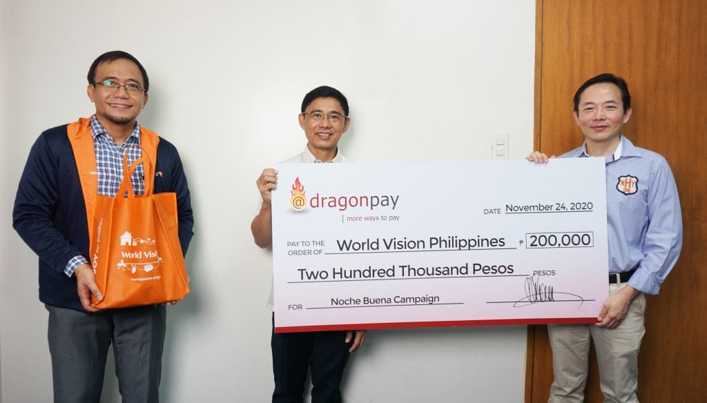 Dragonpay COO Robertson Chiang turns over cash donation to World vision